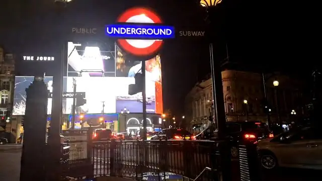 Piccadilly Circus, London, at night with city lights and traffic.