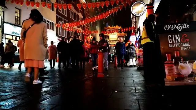 London’s Chinatown at night, with market stalls and lanterns.